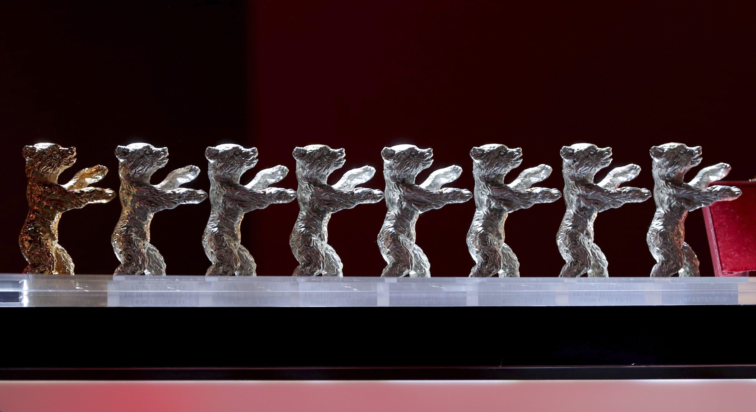 FILE - The Baeren (Bears) awards are lined up during the award ceremony for the 2020 Berlinale Film Festival in Berlin, Germany, on Feb. 29, 2020. Organizers say the annual Berlin International Film Festival is being put off this year due to the coronavirus pandemic and split into two parts later in 2021. (AP Photo/Michael Sohn, File)