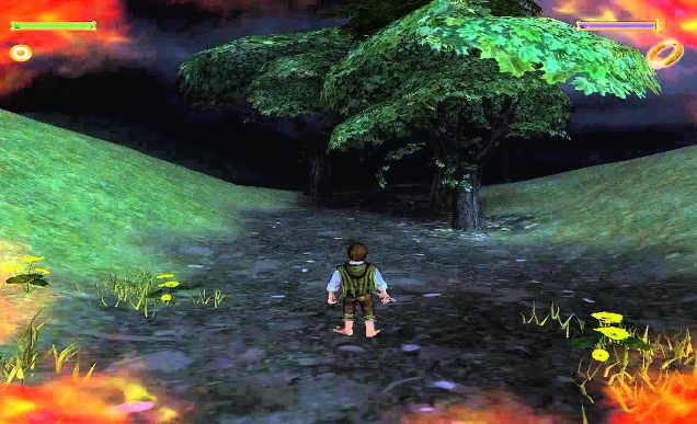 Screenshot from a PC game. Frodo the Hobbit stands in the middle of a cobbled path at night. In each corner of the frame, flames start to creep onto the screen.