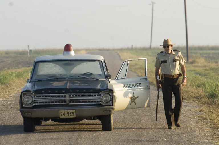 Lew Temple walking in a scene from Texas Chain Saw Massacre: The Beginning
