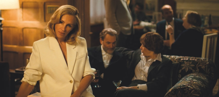 Julia Roberts sits among a gathering in After the Hunt