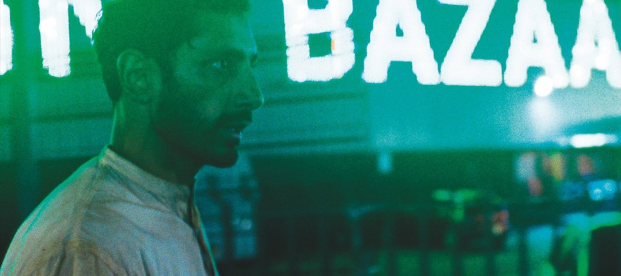 Riz Ahmed as Hamlet glares ominously on the streets of London.jpg