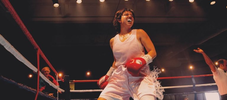 Sydney Sweeney celebrates in the boxing ring as Christy Martin in Christy.