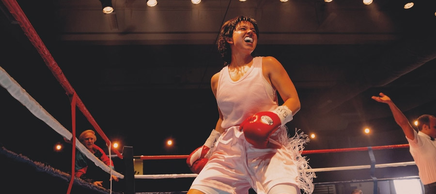 Sydney Sweeney celebrates in the boxing ring as Christy Martin in Christy.