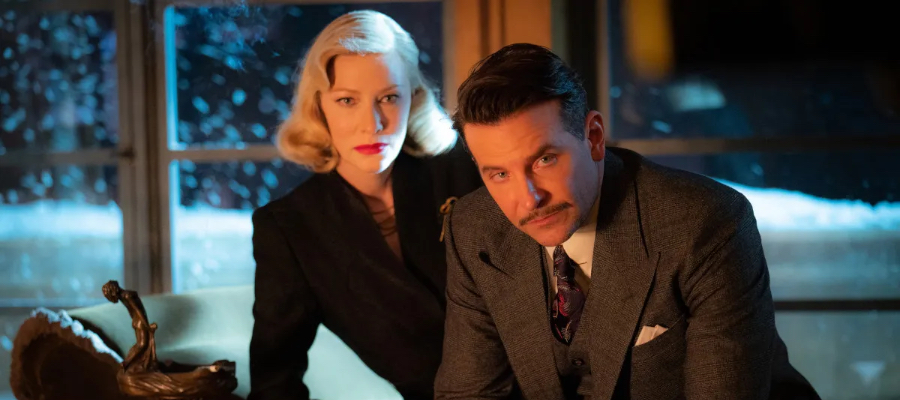 Cate Blanchett and Bradley Cooper put on their best Noir looks in a scene from Nightmare Alley.