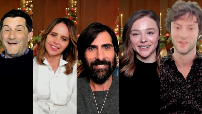Michael Showalter, Felicity Jones, Jason Schwartzman, Chloe Grace Moretz and Dominic Sessa in a video interview with a Christmas set background