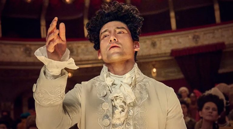 Will Sharpe as Wolfgang Amadeus Mozart in Sky TV's Amadeus. He is seen conducting an unseen orchestra.